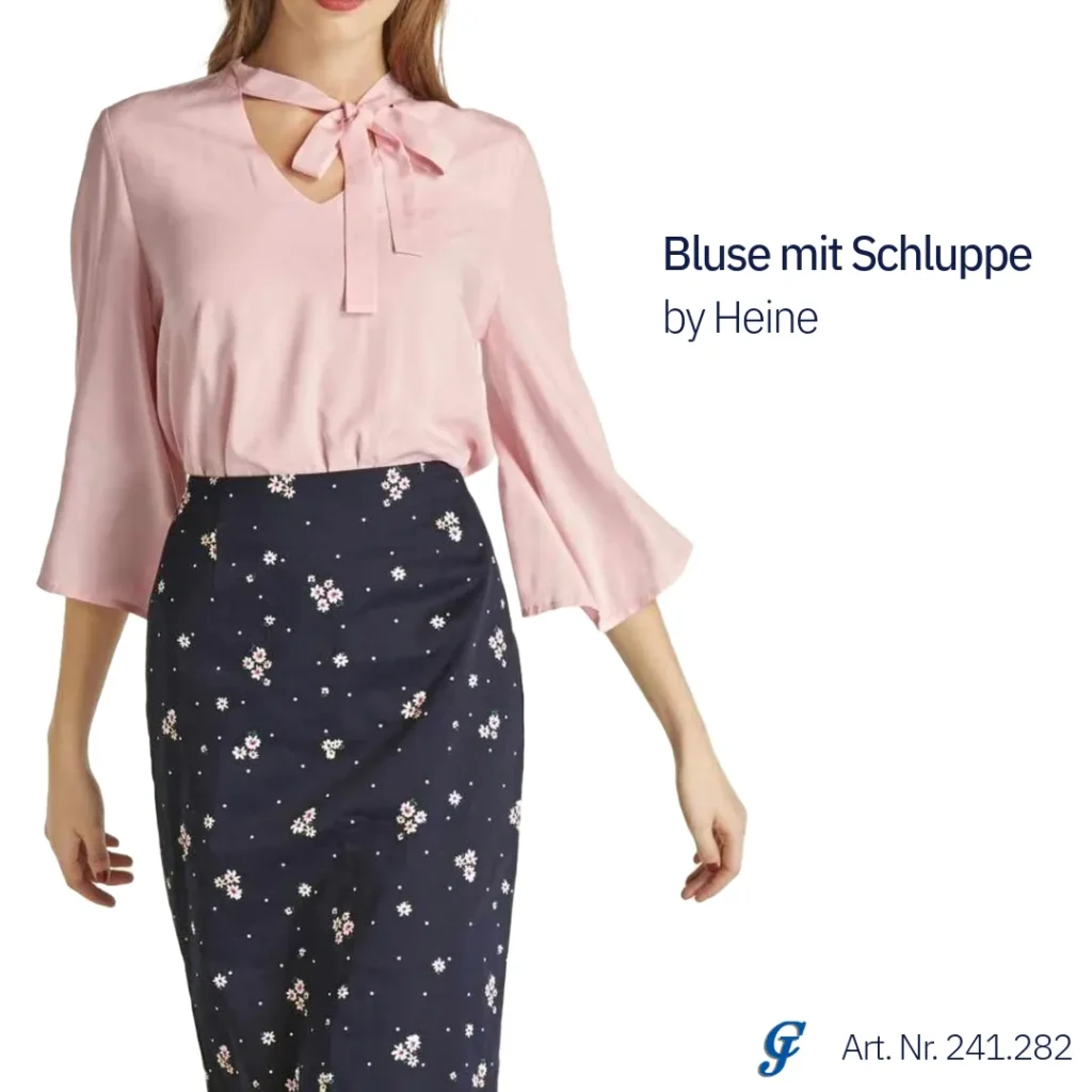 Bluse mit Schluppe von Heine in der Trendfarbe Puderrosa, klassisch-feminine Damenmode.